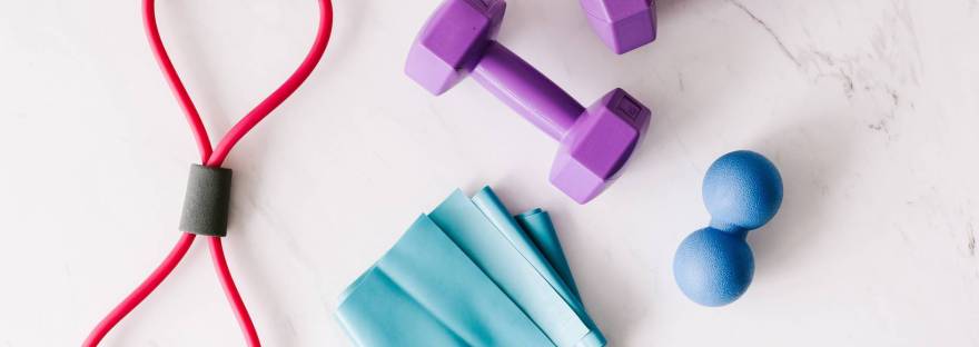 colourful fitness equipment, stretch bands and weights